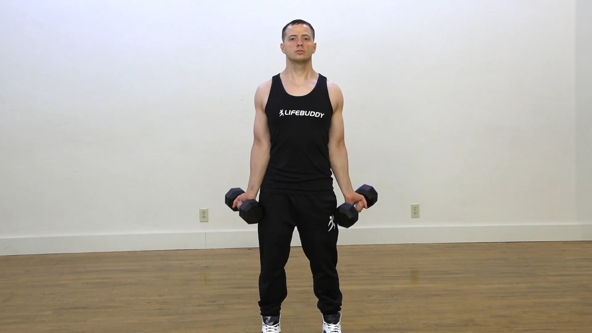 Bicep & Hammer Curls Into Squats exercise demo