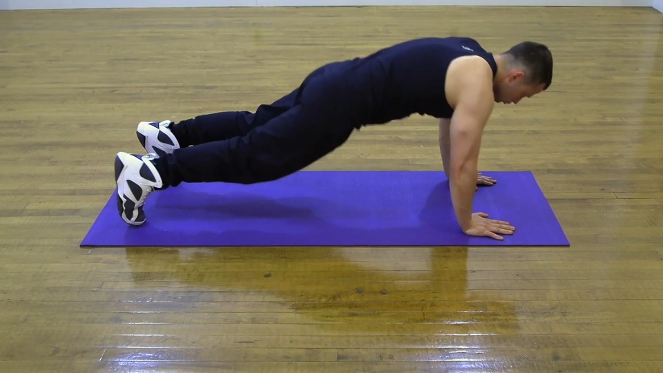 High Plank Opposite Hip Tap exercise demo