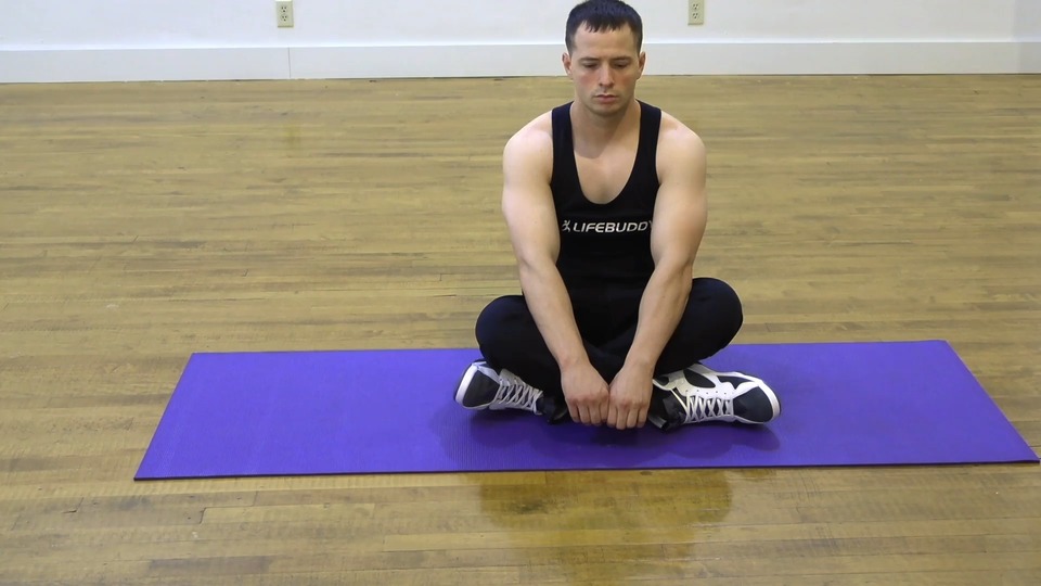 Seated Cross Leg Stretch exercise demo