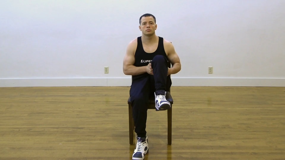 Seated Knee To Chest exercise demo
