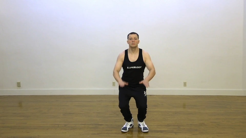 Standing Knee Tuck exercise demo